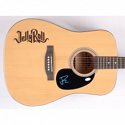 An Acoustic Guitar Signed By Jelly Roll Himself